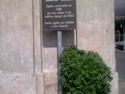 Photo paysage et monuments, Ville-di-Pietrabugno - L'Eglise de Santa Lucia - plaque informative à l'entrée