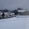 Photo Roussillon-en-Morvan - Blein le Vieil sous la neige avec les maisons et leurs volets clos.