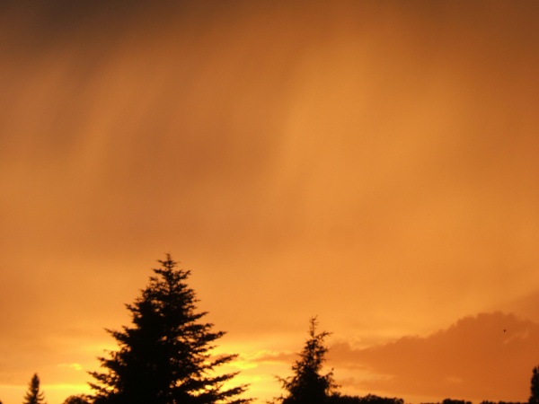 Photo La Chartre-sur-le-Loir - Couché de soleil sur Saint Nicolas